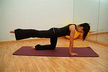 Exercices pilates sur tapis