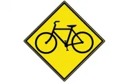 Yellow diagonal warning sign cycle